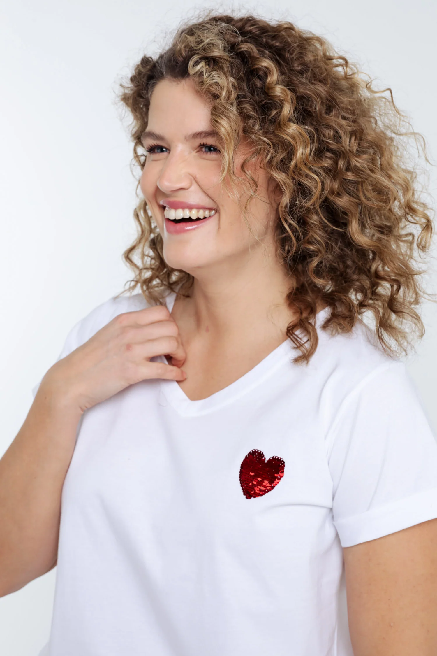 Effen katoenen T-shirt met hart van pailletten - Image 5